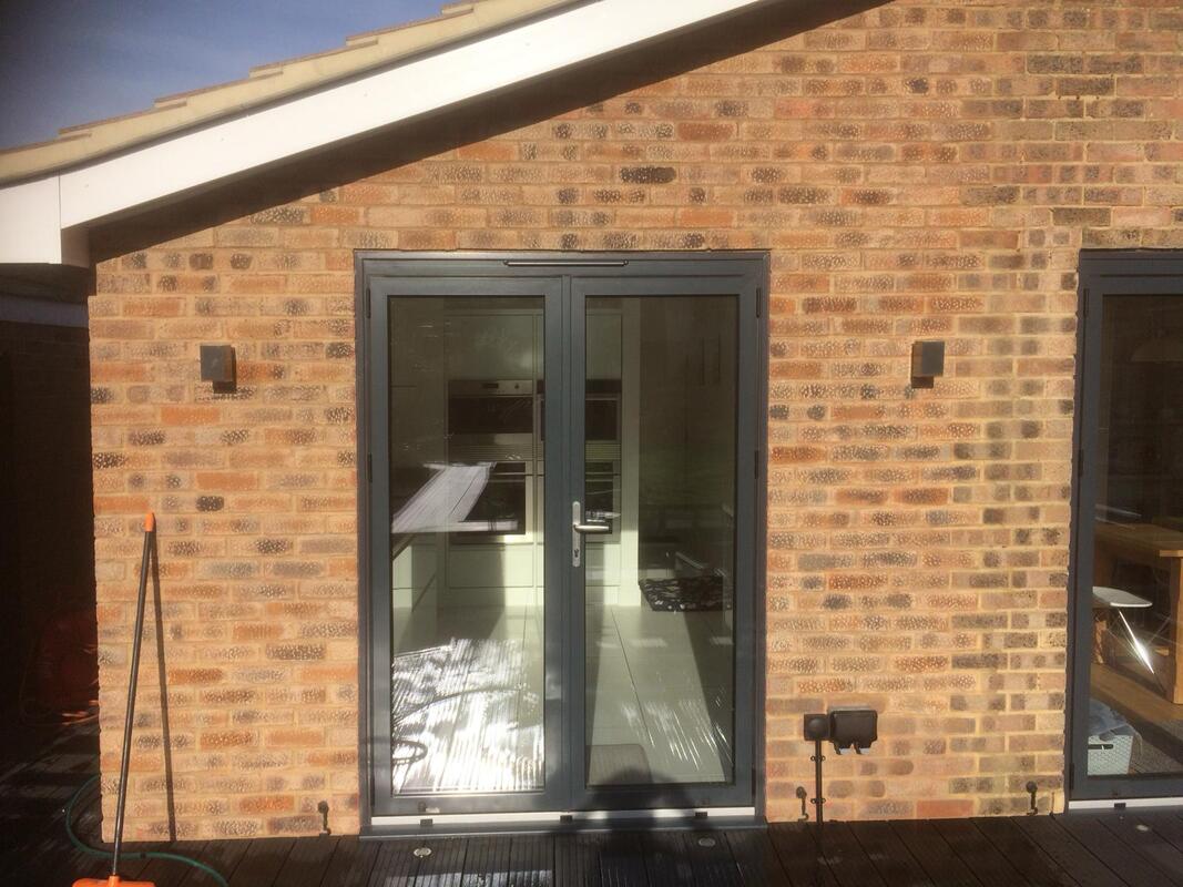 Before and After Pictures of a recent Brick Tinting Job - After restoration work